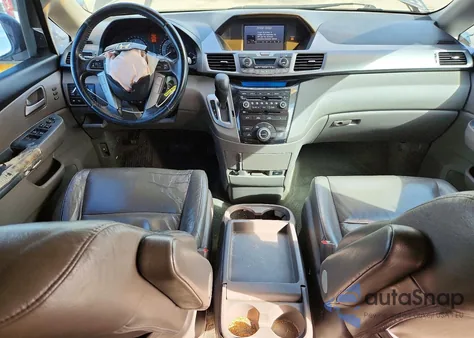 2011 Honda Odyssey Touring z USA, uszkodzony, nr VIN 5FNRL5H91BB008899